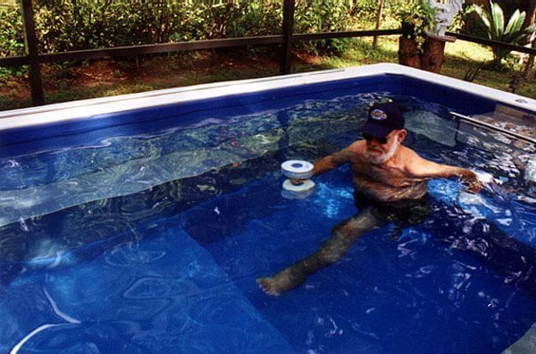 Dennis Henry in his backyard Endless Pool