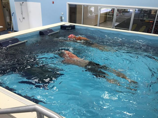 Picture of triathlete learning to swim with the Endless Pools swim current at ProSwim Fitness