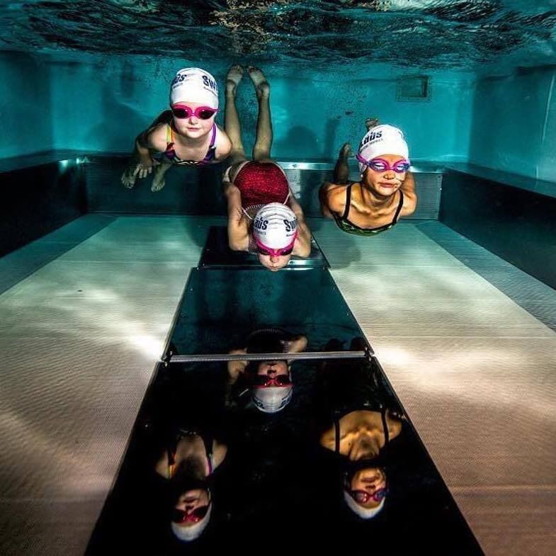 picture of kids swimming in an Endless Pools Commercial pool at SwimLabs