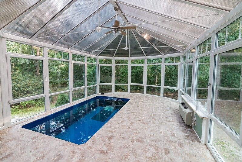 picture of prefab sunroom as a pool enclosure for a fully in-ground Endless Pools Performance model