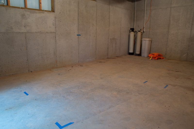 picture of the unfinished basement that would soon house an Endless Pools swimming machine
