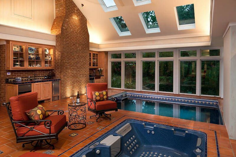 in-ground Original Endless Pools in an open kitchen with skylights
