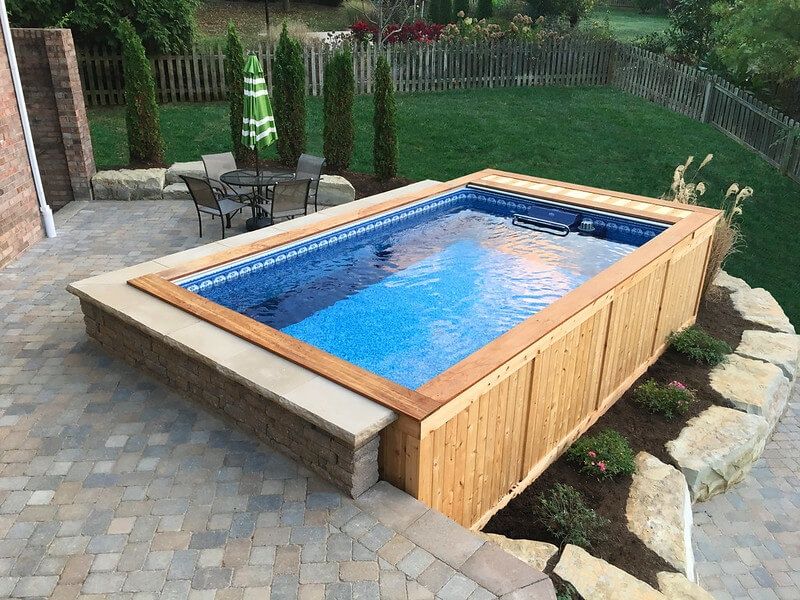 picture of Endless Pools High Performance model abutting a backyard patio