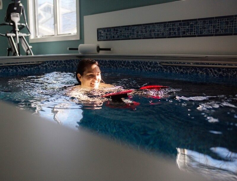 Kat exercises in her Endless Pools Performance model in Massachusetts