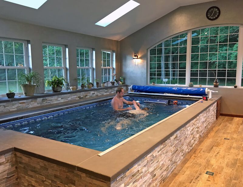 picture of an Endless Pools Performance model installed in a sunroom