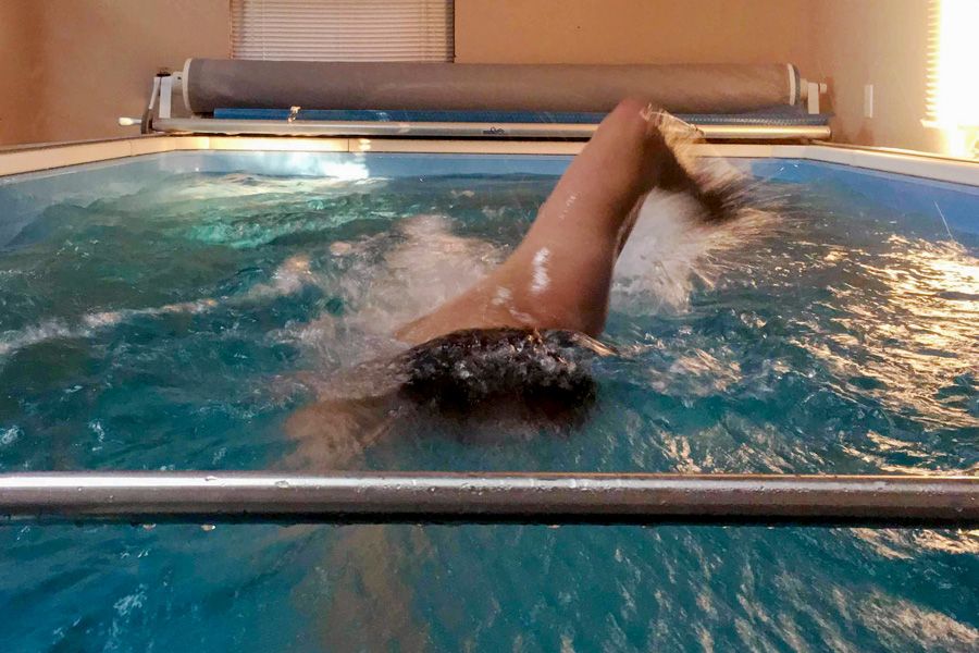 Paratriathlete Chris M training in his Endless Pools swimming machine