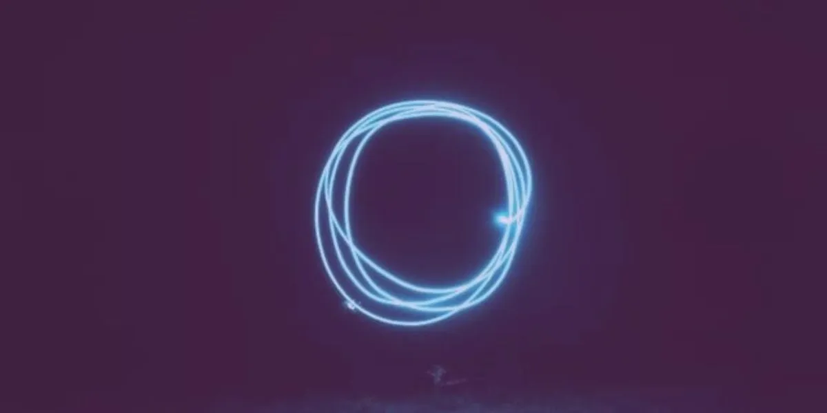 A neon circle. It represents a closed feedback loop