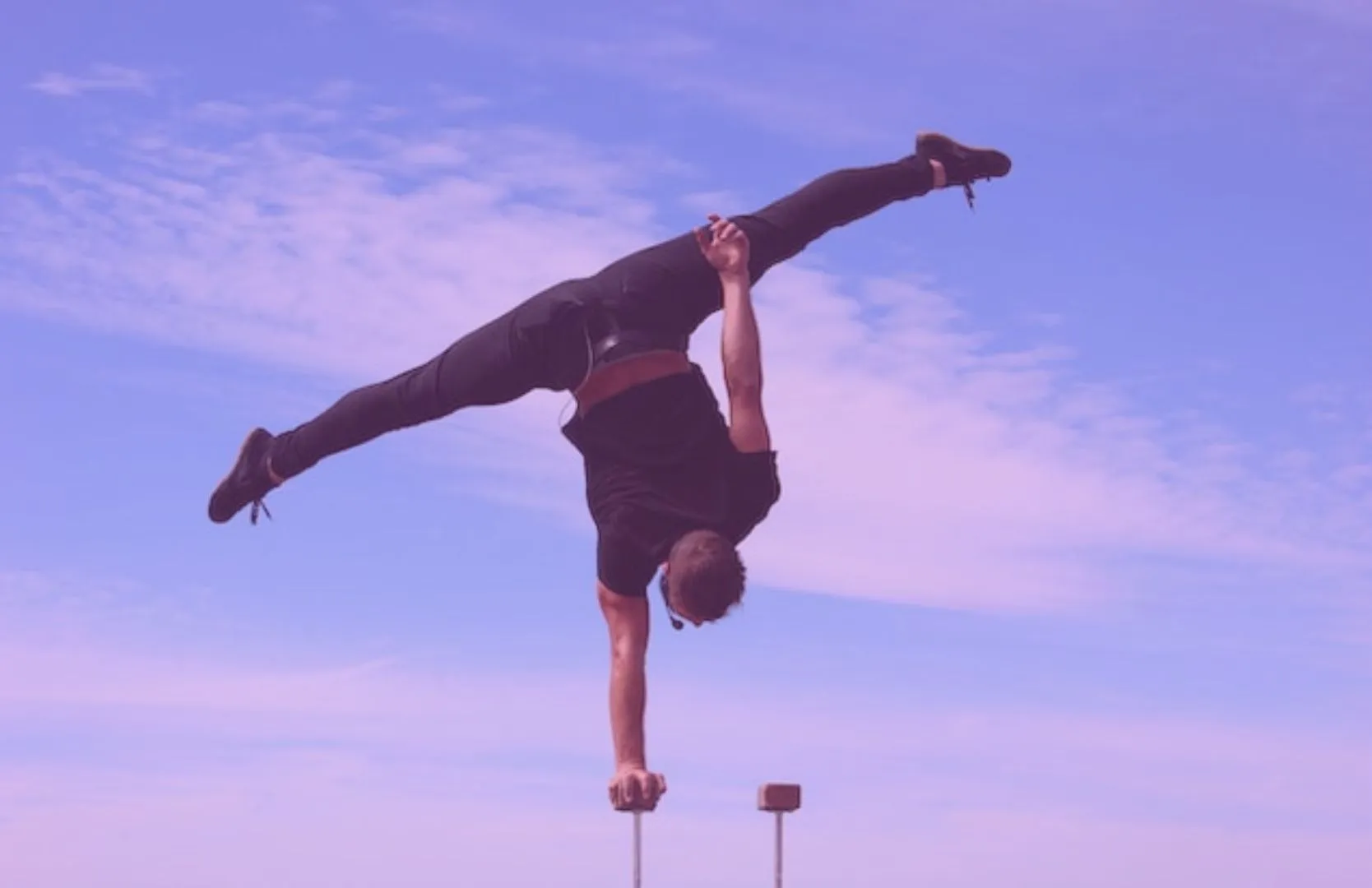 Man doing gymnastics in the air, represents the flexability needed for agile roadmapping