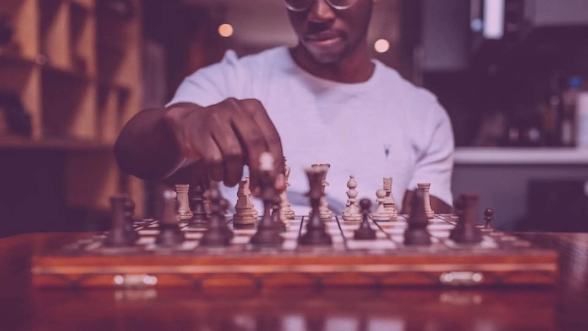 Man playing chess, representing a product strategy
