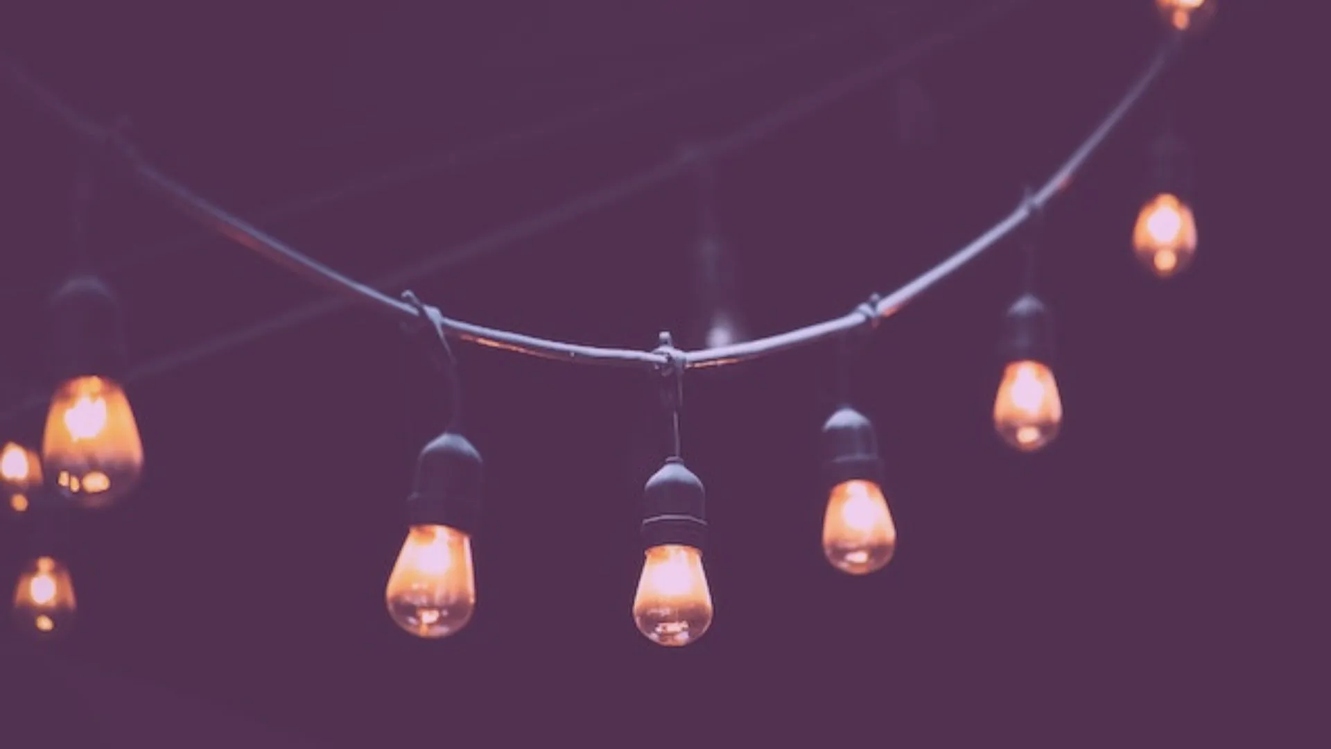 Lightbulbs on a line, representing new ideas for product features