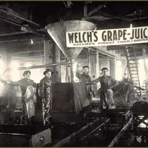 Four workers in a Welch's Grape Juice factory, circa 1890