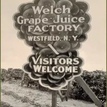 Signage from 1854 stating, "Welch Grape Juice Factory, Westfield, N.Y. -- Visitors Welcome"