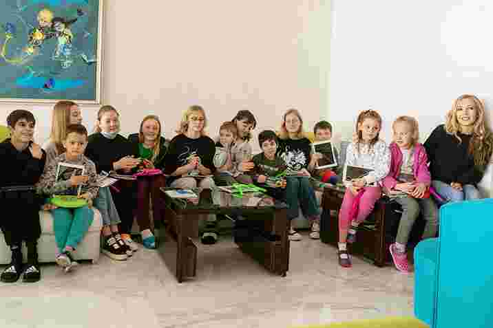 Ukrainian children receiving iPads and laptops at a refugee residence in Varna, Bulgaria