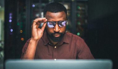 A SOC expert monitoring IT infrastructure