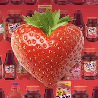 Strawberry shaped like a heart with a Welch's Strawberry Products background